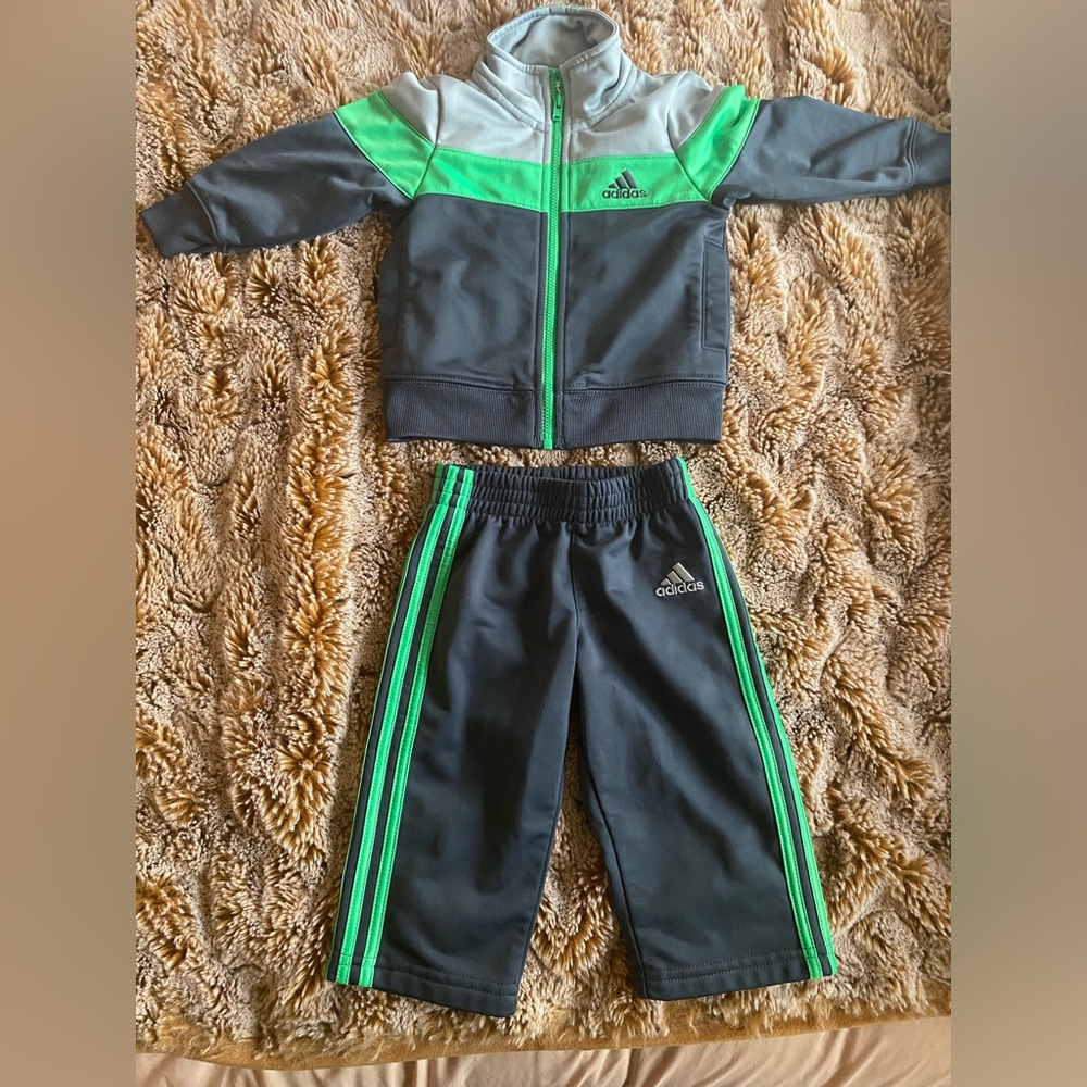 Like new grey and green Adidas track suit in size 9 months